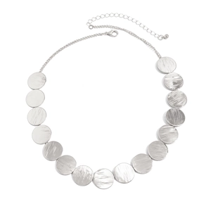 Detail of silver brushed metal disc necklace with lobster clasp and extension chain