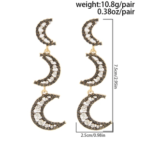 Détails de boucles d'oreilles en éventail avec cristaux noirs et blancs et placage d'or