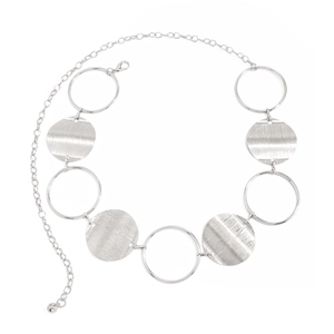 Close-up of silver metal waist chain featuring textured discs and open ring links