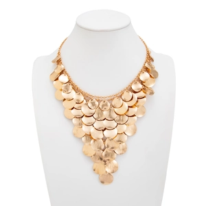 Detail of gold layered metal discs forming a geometric triangle fringe on a statement necklace