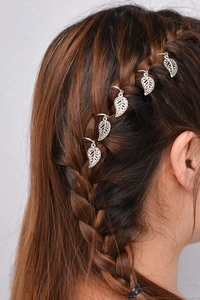 Detailed view of leaf charm dreadlock hair rings in retro silver finish for braids