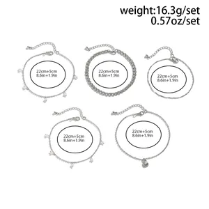 Guida alle taglie per set di 5 cavigliere argentate con perline e ciondolo a conchiglia