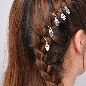 Silver Hamsa hand hair rings for braids showing a set of 5 on dark braided hair