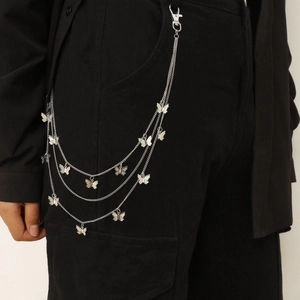 Detail of silver multi-layer body chain featuring butterfly pendants and lobster clasp