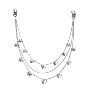 Close-up of triple-layered silver hip-hop pants chain with butterfly pendants and lobster clasps
