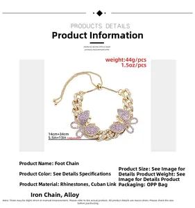 Detail view of gold Cuban chain anklet with purple rhinestone butterfly charms