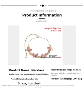 Detailed view of adjustable gold Cuban chain with pink rhinestone butterfly pendants
