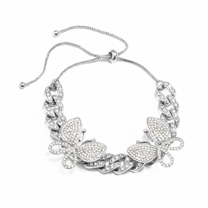 Macro detail of silver butterfly anklet with sparkling rhinestones and adjustable slider clasp
