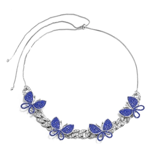 Detail of adjustable sliding buckle and Cuban chain with blue butterfly rhinestones