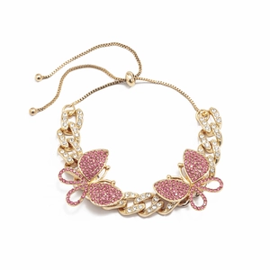 Detail of adjustable gold butterfly anklet with pink and clear crystal Cuban links