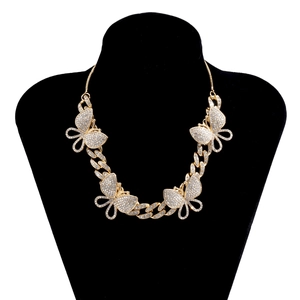 Detailed close-up of Cuban link chain featuring four colorful rhinestone butterfly pendants