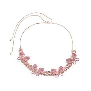 Close-up of pink crystal butterfly charms on a rose gold adjustable link chain necklace