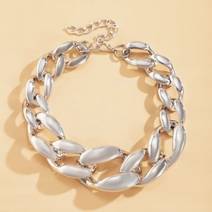 Macro shot of silver-plated punk chain necklace with thick links and lobster clasp