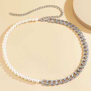 Detail of vintage faux pearl and silver geometric chain belt with adjustable lobster clasp