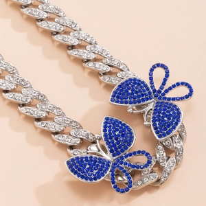 Hip-hop silver cuban link anklet featuring blue crystal butterfly charms and pave diamonds