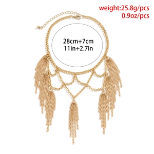 Detail of layered gold fringe anklet showing measurements of 28cm plus 7cm length