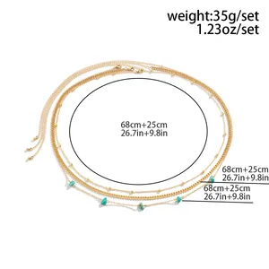 Three-layer gold waist chain with turquoise stones and flat snake chain measurement details