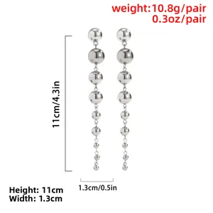 Silver punk style multi-bead long drop earrings with eight graduated spheres in mirror finish