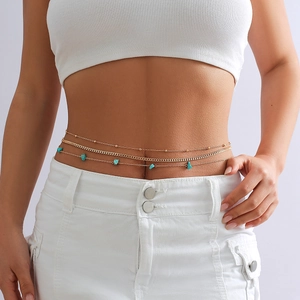 Layered gold belly chain with turquoise stones in a bohemian beach style for women