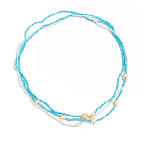 Détail de la chaîne de taille multicouche style océan avec étoiles de mer et tortue