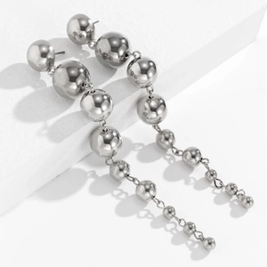 Polished silver metal bead drop earrings with minimalist tiered sphere design detail