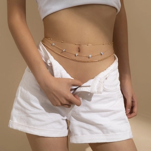Three-layer gold waist chain with light blue crushed stones for beach body jewelry style