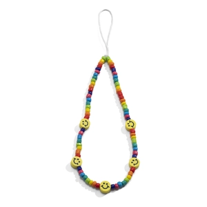 Close-up of rainbow macaron beaded phone strap featuring yellow smiley face charms