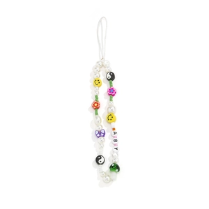 Detailed shot of handmade colorful bead phone charm with pearls and BABY letter beads