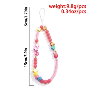 Detailed view of colorful macaron beaded phone strap with smileys and flowers