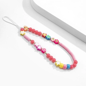 Close-up of colorful handmade beaded phone strap with smiling flower and star beads