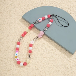Close-up of colorful beads phone strap with pink flowers and BABY letter charms