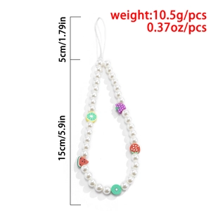 Detail of beaded phone strap featuring faux pearls and colorful mixed fruit beads