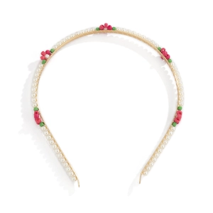 Minimalist pearl headband with colorful bead flowers on a golden metal base