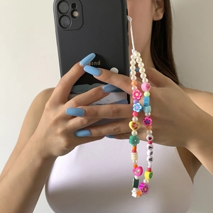 Colorful beaded phone strap with faux pearls, flowers, hearts and acrylic letter beads