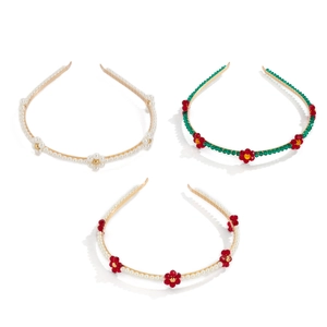 Three-piece set of floral pearl headbands with metal frames and daisy accents