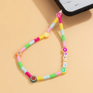 Detailed macro view of colorful handmade beaded phone strap with fruit and baby letter beads