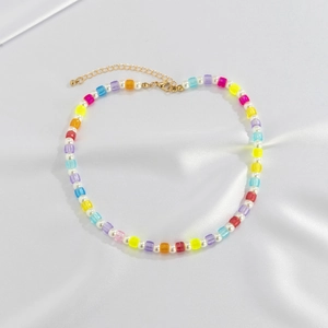 Handmade colorful bead necklace with white pearls and translucent cubes for summer