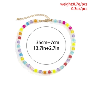 Handmade colorful geometric beaded necklace with white pearls and gold lobster clasp