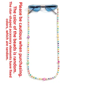Detail of colorful seed bead eyewear chain with star accents and silicone loops