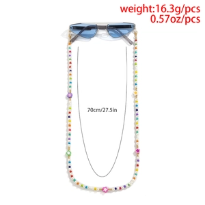 Detailed view of 70cm colorful fruit clay bead eyewear chain with star charms