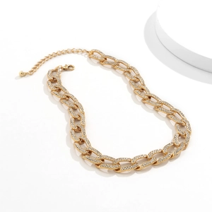 Gouden cubaanse schakelketting voor dames met fonkelende kristallen strasstenen