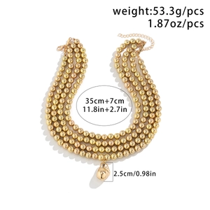 Detail of layered gold beaded chain necklace with weight and length measurements