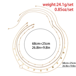 Détail de la chaîne de corps dorée multicouche avec pendentif cœur et dimensions affichées