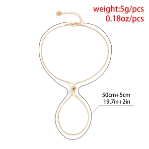 Detail of adjustable gold snake chain anklet with lobster clasp and Love tag engraving