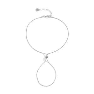 Detail of silver snake chain anklet showing lobster clasp and Love engraved heart tag