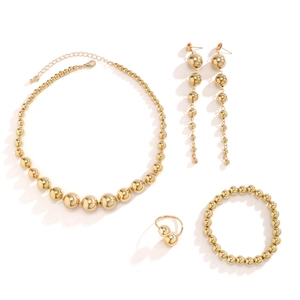 Detailed view of 4-piece chunky gold bead jewelry set with necklace and earrings