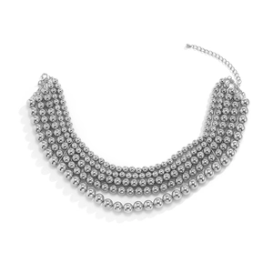Detail showing five-layered polished silver beaded necklace with adjustable lobster clasp