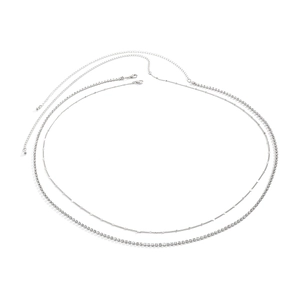 Detail of silver double-layer waist chain featuring rhinestone tennis link and round discs