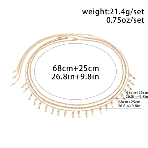 Détail d'une chaîne de taille dorée multicouche avec cristaux incluant poids et dimensions
