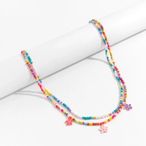 Bohemian double-layer multicolored beaded body chain with vibrant enamel flower pendants